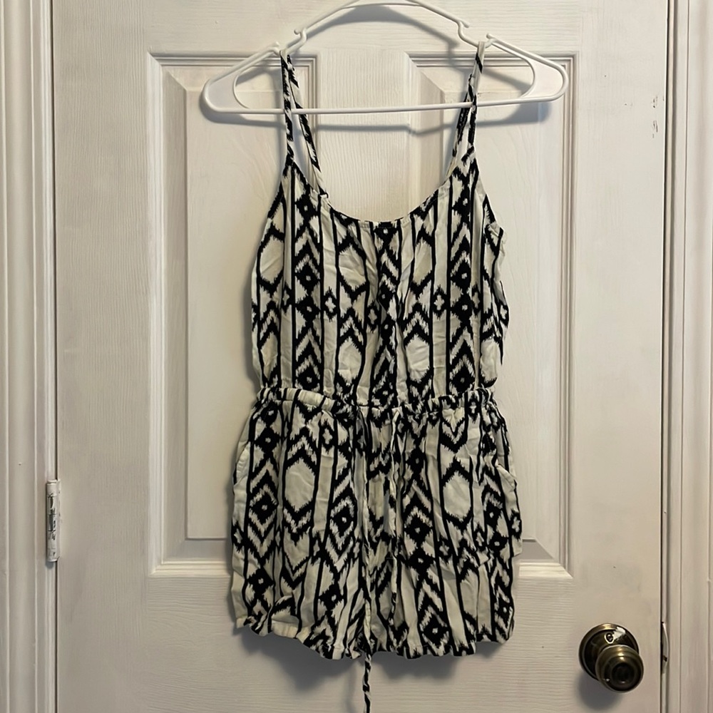 Cream and black geometric-patterned romper